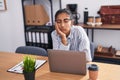 Young beautiful hispanic woman business worker using laptop working at office Royalty Free Stock Photo
