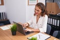 Young beautiful hispanic woman call center agent working at office Royalty Free Stock Photo