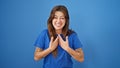 Young beautiful hispanic woman laughing a lot over isolated blue background Royalty Free Stock Photo