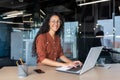 Young beautiful hispanic woman working inside modern office, businesswoman smiling and looking at camera at work using Royalty Free Stock Photo