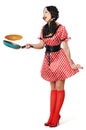 Young beautiful housewife with frying pan Royalty Free Stock Photo