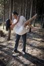 Young beautiful Indian couple dancing in forest Royalty Free Stock Photo