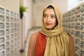 Young beautiful Indian Muslim woman checking the mail