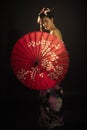 Young beautiful Japanese lady in traditional kimono Royalty Free Stock Photo