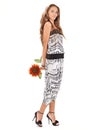 Young beautiful lady in harem pants with sunflower Royalty Free Stock Photo