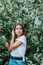 Young beautiful lady surrounded by cherry bird in spring Royalty Free Stock Photo