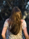 Long Haired Woman in the Forest Rear View Royalty Free Stock Photo