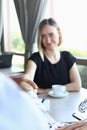 Young beautiful man and woman meet in cafe business Royalty Free Stock Photo