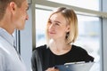 Young beautiful man and woman meet in cafe business Royalty Free Stock Photo