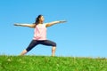 Young Beautiful Mixed Race Woman Doing Yoga Warrior Pose Royalty Free Stock Photo