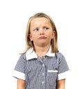 Young beautiful and moody schoolgirl in uniform looking tired bored and upset in frustrated face expression isolated on white back