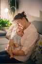 Young beautiful mother, breastfeeding her newborn baby boy Royalty Free Stock Photo