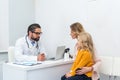 young beautiful mother and daughter visiting pediatrist