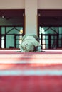 Young beautiful Muslim Woman Praying In Mosque