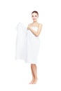 Young, beautiful and natural woman wrapped in towel isolated on Royalty Free Stock Photo