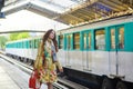 Young beautiful Parisian woman in subway Royalty Free Stock Photo