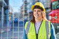 Young beautiful plus size woman architect smiling confident standing at street