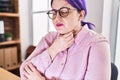 Young beautiful plus size woman business worker suffering for throat pain at office Royalty Free Stock Photo