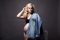 Young beautiful pregnant woman. Blonde girl with big belly Royalty Free Stock Photo