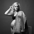 Young beautiful pregnant woman. Blonde girl with big belly Royalty Free Stock Photo