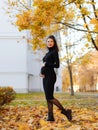 Young beautiful pregnant woman with dark hair in a black tight dress Royalty Free Stock Photo