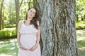 Young beautiful pregnant woman with long hair Royalty Free Stock Photo