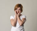 Young beautiful red hair woman smiling happy and cheerful in friendly joyful face expression