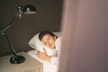 Young Beautiful Relaxation Woman Sleeping In Bed. Portrait Of Beautiful Female Resting On Comfortable Bed In Morning. People Sleep Royalty Free Stock Photo