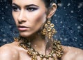 Young, beautiful and rich woman in jewels Royalty Free Stock Photo