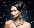 Young, beautiful and rich woman in jewels Royalty Free Stock Photo