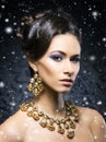 Young, beautiful and rich woman in jewels Royalty Free Stock Photo