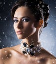 Young, beautiful and rich woman in jewels Royalty Free Stock Photo