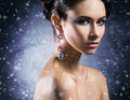 Young, beautiful and rich woman in jewels Royalty Free Stock Photo