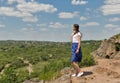 Young beautiful on a rocks with Migeya valley view, Ukraine.