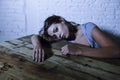 Young beautiful sad and depressed woman looking wasted and frustrated suffering pain and depression feeling low and break down Royalty Free Stock Photo