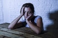 Young beautiful sad and depressed woman looking wasted and frustrated suffering pain and depression feeling low and break down Royalty Free Stock Photo