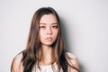 Young beautiful sad woman serious and concerned looking Royalty Free Stock Photo