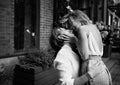 Young beautiful Sensual couple laughing, having fun on the street. Happy man and woman in love embracing Royalty Free Stock Photo