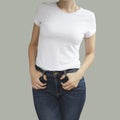 Young beautiful female with blank white shirt, front. Ready Royalty Free Stock Photo