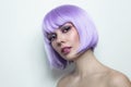 Beautiful girl with violet hair and fancy make-up Royalty Free Stock Photo