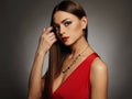 Young beautiful woman.Beauty girl wearing jewelry.elegant lady in red dress Royalty Free Stock Photo