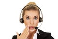 Young beautiful shocked helpline operator Royalty Free Stock Photo