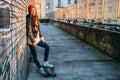 Skater woman at sunset enjoying the sun Royalty Free Stock Photo