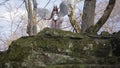 Woman in image of warlike Valkyrie with wings holding weapon and shield