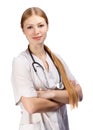 Young beautiful smiling blonde woman in white doctor`s smock wit