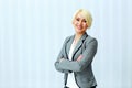 Young beautiful smiling businesswoman with arms folded Royalty Free Stock Photo