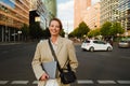 Young beautiful smiling happy business woman with laptop looking camera Royalty Free Stock Photo