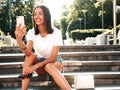 Beautiful woman posing in the street