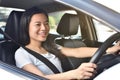 Young beautiful smiling woman driving her new car Royalty Free Stock Photo