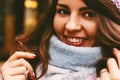 Young beautiful smiling woman in scarf and hat in autumn or winter Royalty Free Stock Photo